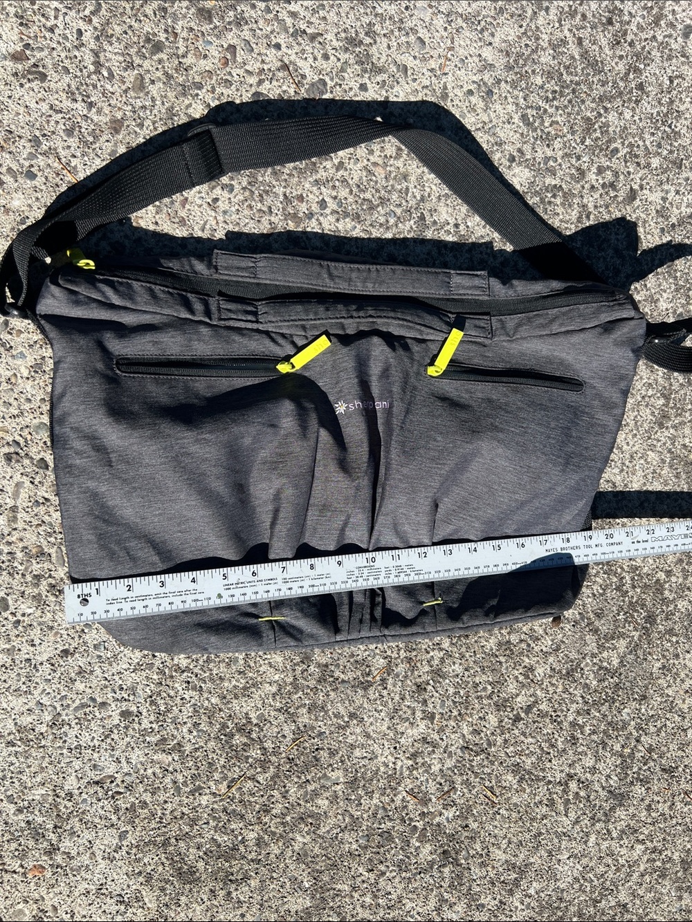 Sherpani Charcoal Crossbody Travel Bag with Neon Yellow Accents